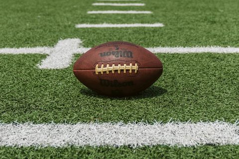 A football on a lined field